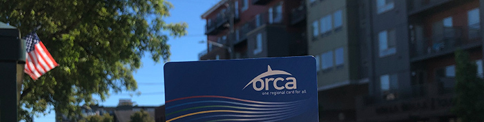 Orca card apartment building in background